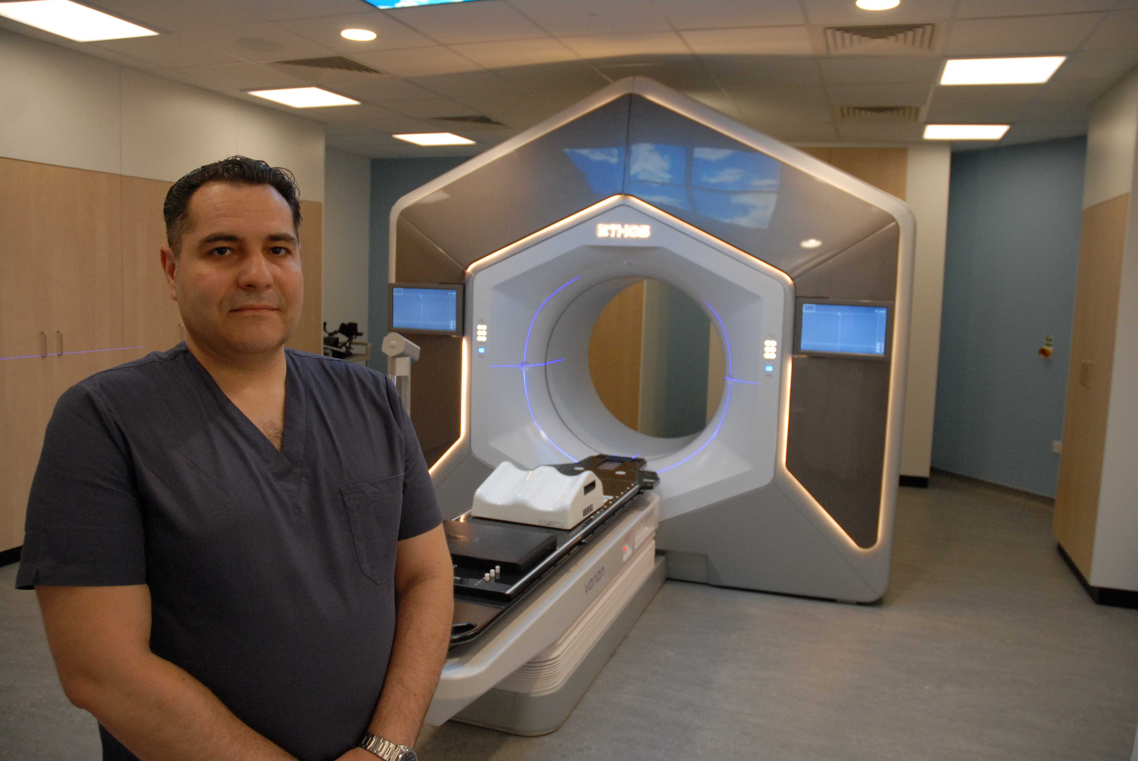 Rafael Moleron with one of the new adaptive radiotherapy machines