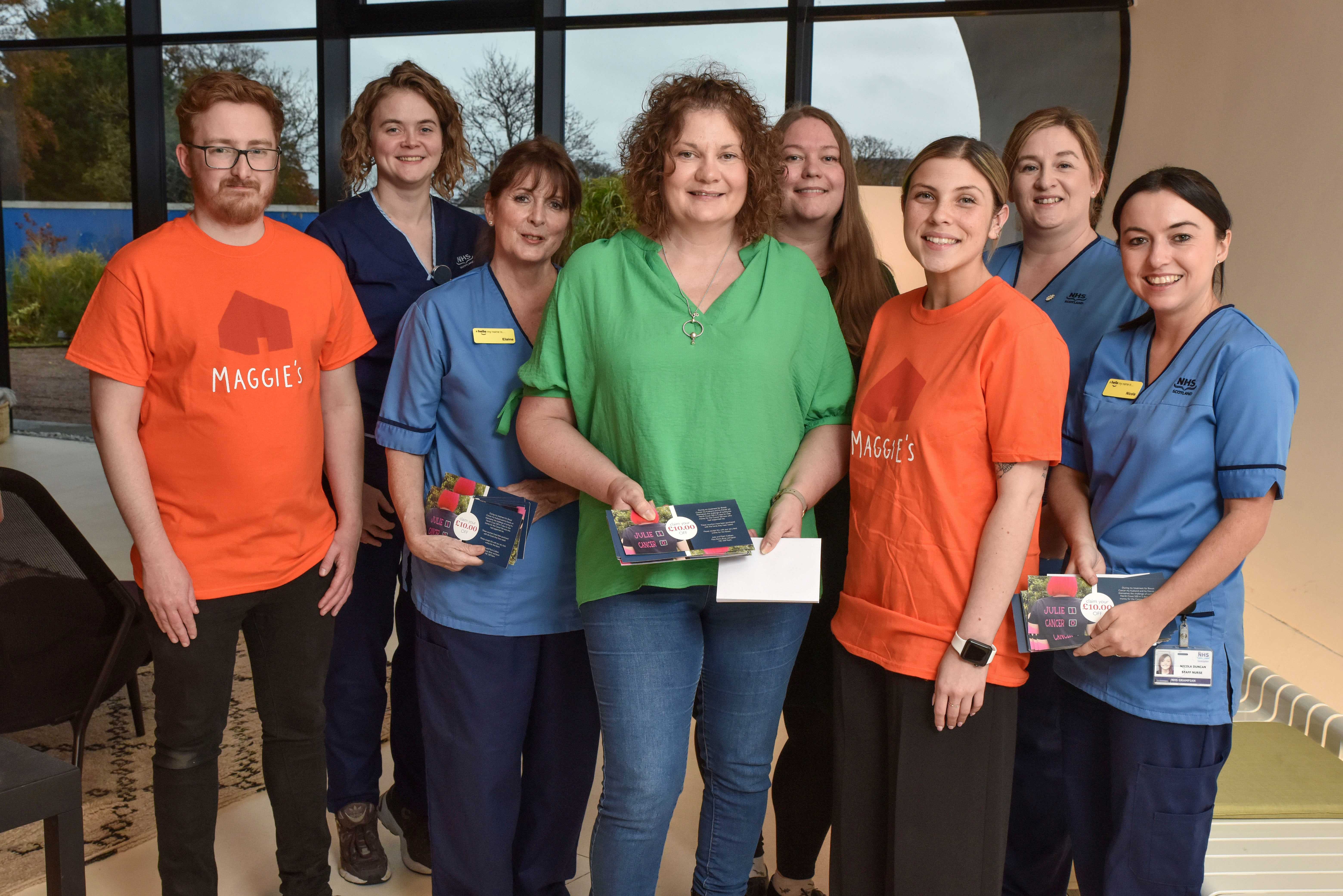 Donation 3 (L-R) Ryan Hill (Centre Fundraiser, Maggie's Aberdeen), Nataleigh Mcgonagle, Elaine Breen, Julie Cobban, Vera Schroeter (Centre Head, Maggie's Aberdeen), Rebecca Stewart (Centre Fundraising Organiser, Maggie's Aberdeen), Shona Davidson, Nicola Duncan, ©NHS Grampian (L-R) Ryan Hill (Centre Fundraiser, Maggie's Aberdeen), Nataleigh Mcgonagle, Elaine Breen, Julie Cobban, Vera Schroeter (Centre Head, Maggie's Aberdeen), Rebecca Stewart (Centre Fundraising Organiser, Maggie's Aberdeen), Shona Davidson, Nicola Duncan