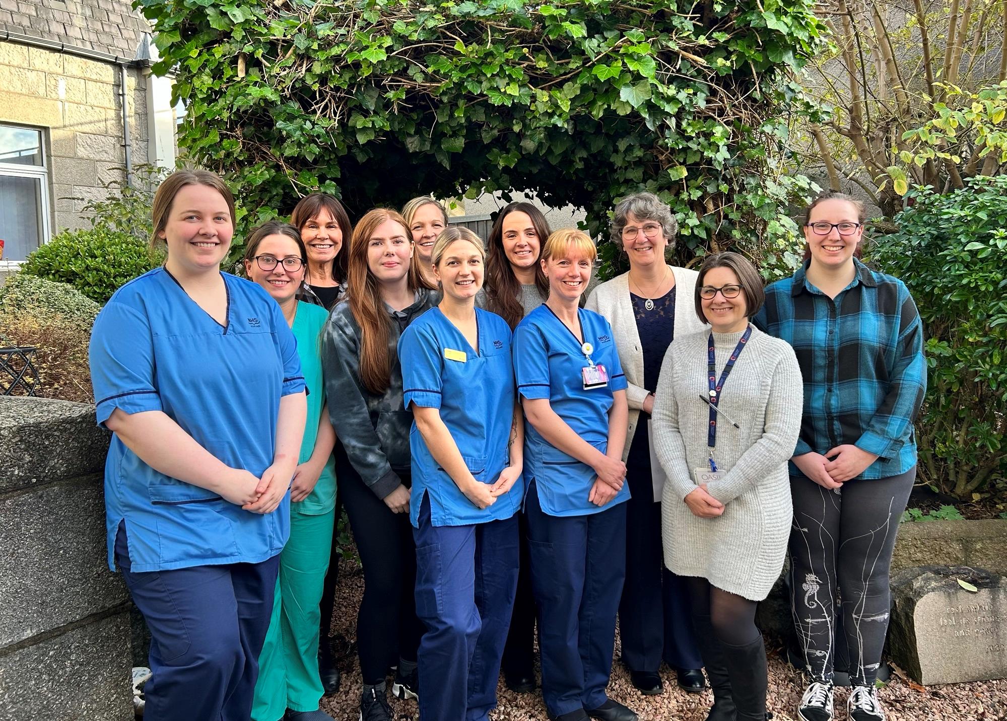 NHS Grampian marks 30 years of ward dedicated to pregnancy loss , ©NHS Grampian Photos capture members of the team from the Rubislaw Ward in their garden area at Aberdeen Maternity Hospital. While just a handful of team members are on shift at any one time, we were lucky to catch up with them following a training session.