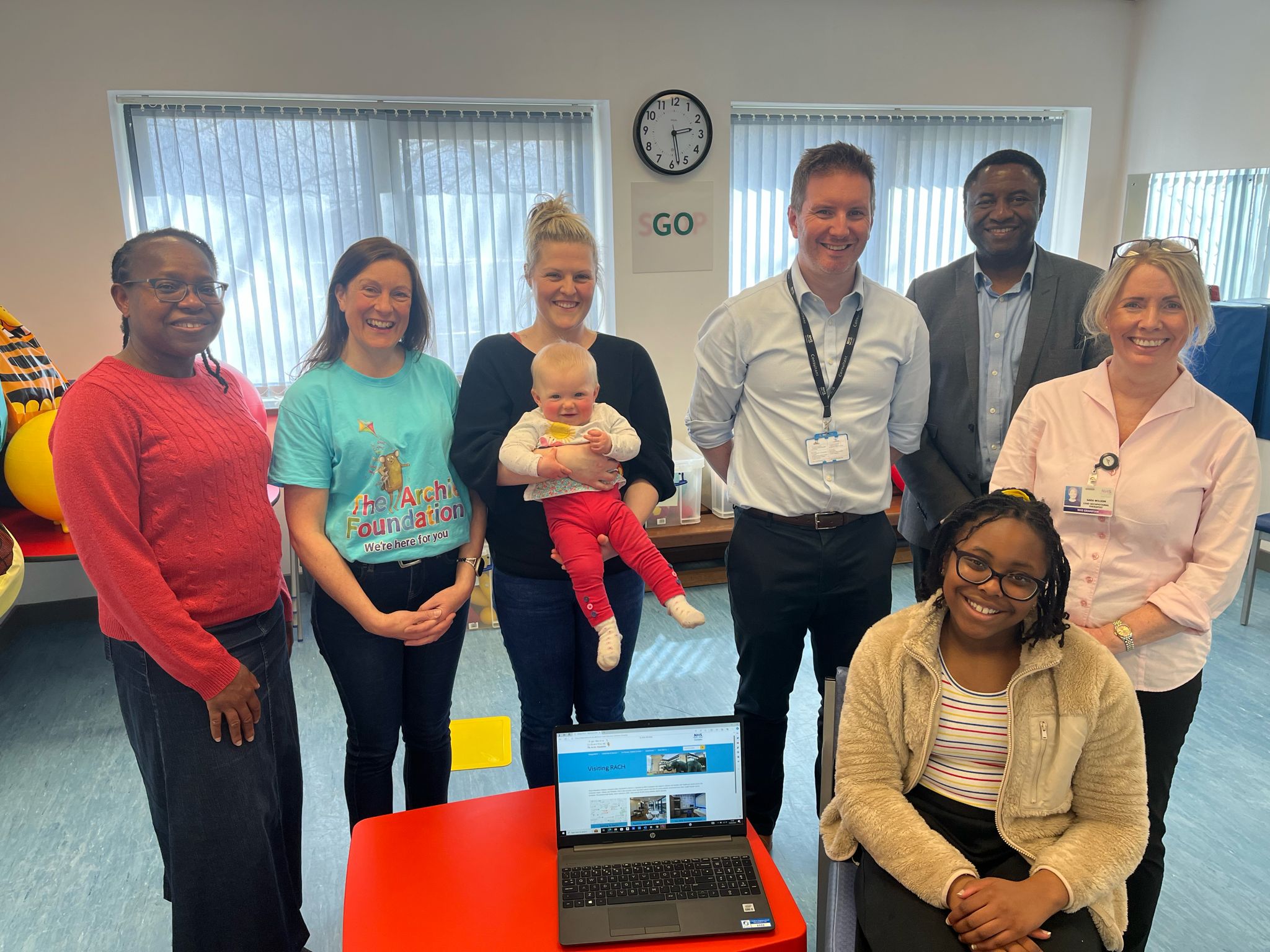 (L to R): Akpobaro Uwuijaren, Paula Cormack, Nina Currie holding her baby Sophie, Mike Reidy, Innocent Uwuijaren and Sara Wilson, with Evangeline Uwuijaren in front.